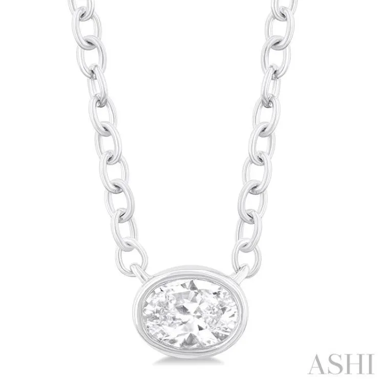 1/6 Ctw Petite East-West Bezel Set Oval Cut Diamond Fashion Pendant With Chain in 10K White Gold