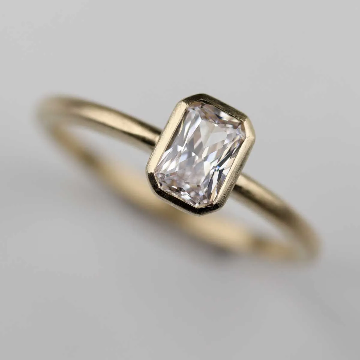 Emerald Cut Classic Bezel Solitaire Engagement Ring